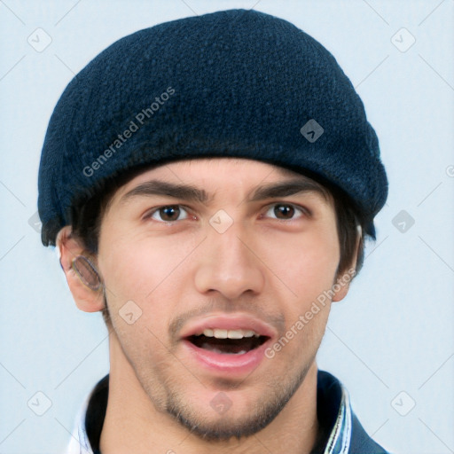 Joyful white young-adult male with short  black hair and brown eyes