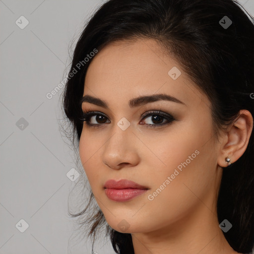 Neutral white young-adult female with long  brown hair and brown eyes