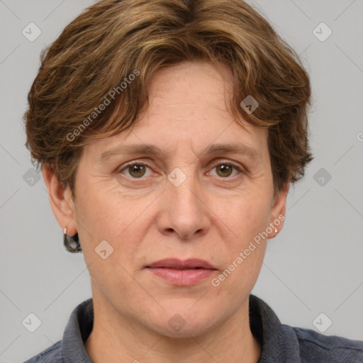 Joyful white adult male with short  brown hair and grey eyes