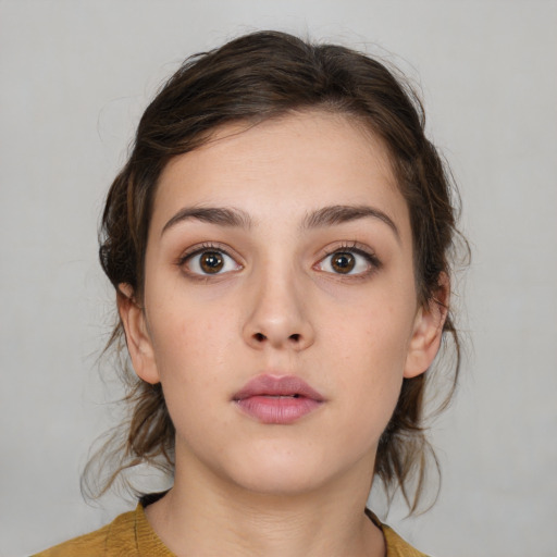 Neutral white young-adult female with medium  brown hair and brown eyes