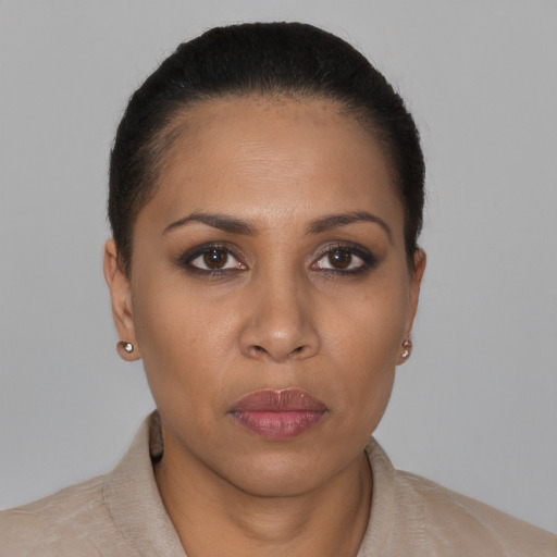 Neutral latino young-adult female with short  black hair and brown eyes
