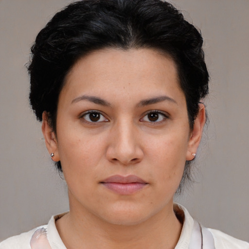 Neutral latino young-adult female with short  black hair and brown eyes
