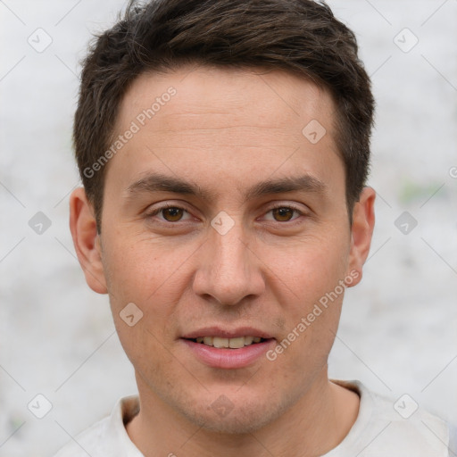 Joyful white adult male with short  brown hair and brown eyes