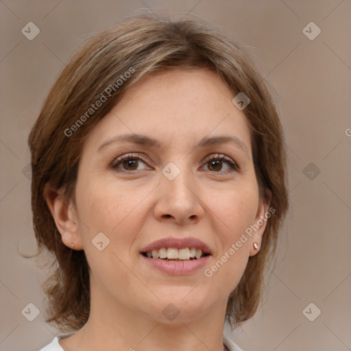 Joyful white adult female with medium  brown hair and brown eyes