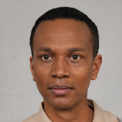 Neutral black adult male with short  black hair and brown eyes