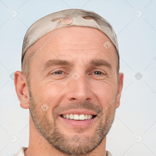 Joyful white adult male with short  brown hair and grey eyes