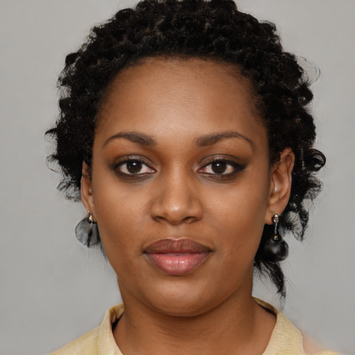 Neutral black young-adult female with medium  black hair and brown eyes