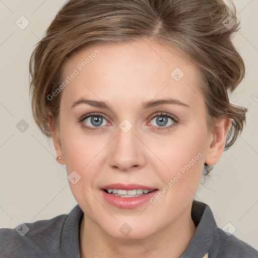 Joyful white young-adult female with medium  brown hair and blue eyes