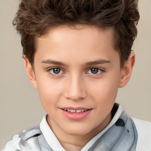 Joyful white child male with short  brown hair and brown eyes