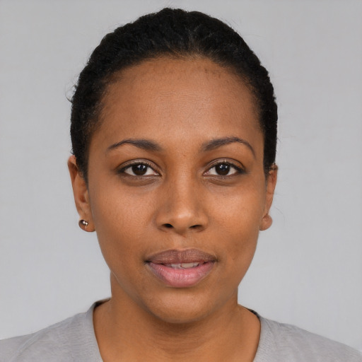Neutral black young-adult female with short  black hair and brown eyes