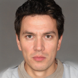 Neutral white adult male with short  brown hair and brown eyes