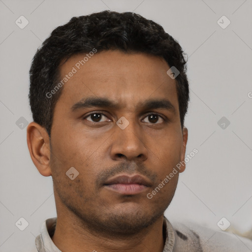 Neutral latino young-adult male with short  black hair and brown eyes