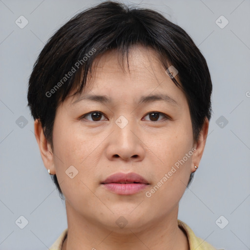 Neutral asian young-adult female with short  brown hair and brown eyes