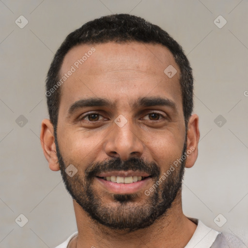 Joyful white young-adult male with short  black hair and brown eyes