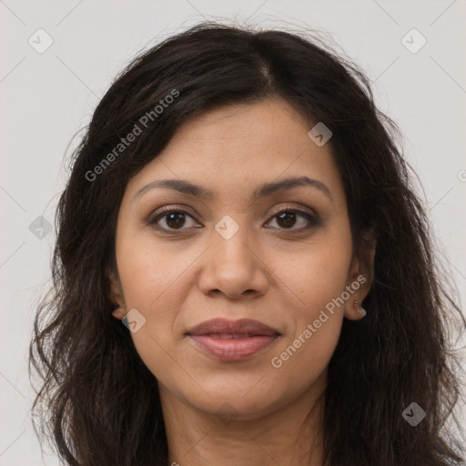 Joyful latino young-adult female with long  brown hair and brown eyes