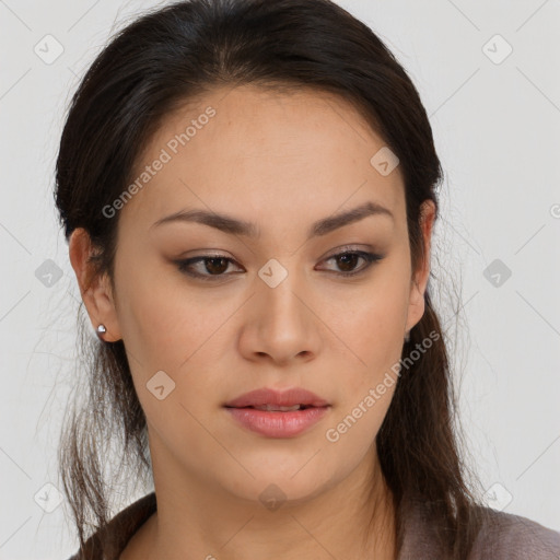 Joyful asian young-adult female with long  brown hair and brown eyes