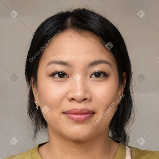 Joyful asian young-adult female with medium  brown hair and brown eyes