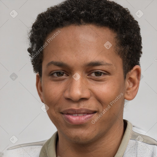 Joyful black young-adult male with short  brown hair and brown eyes