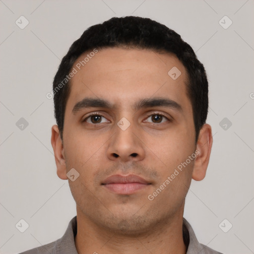 Neutral latino young-adult male with short  black hair and brown eyes