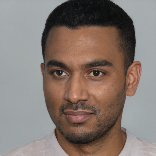 Neutral black young-adult male with short  black hair and brown eyes