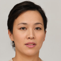 Neutral asian young-adult female with short  brown hair and brown eyes