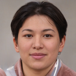 Joyful asian young-adult female with short  brown hair and brown eyes