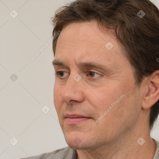 Neutral white adult male with short  brown hair and brown eyes