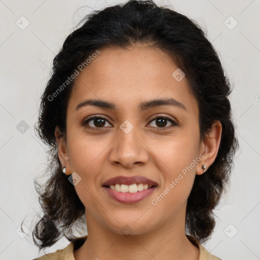 Joyful latino young-adult female with medium  brown hair and brown eyes