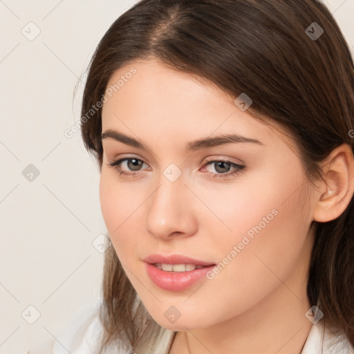 Neutral white young-adult female with medium  brown hair and brown eyes