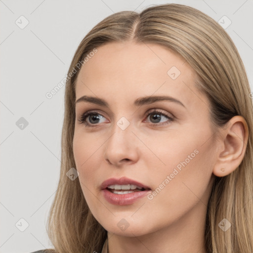 Neutral white young-adult female with long  brown hair and brown eyes