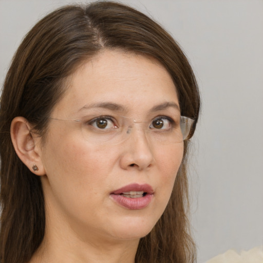 Neutral white young-adult female with medium  brown hair and grey eyes