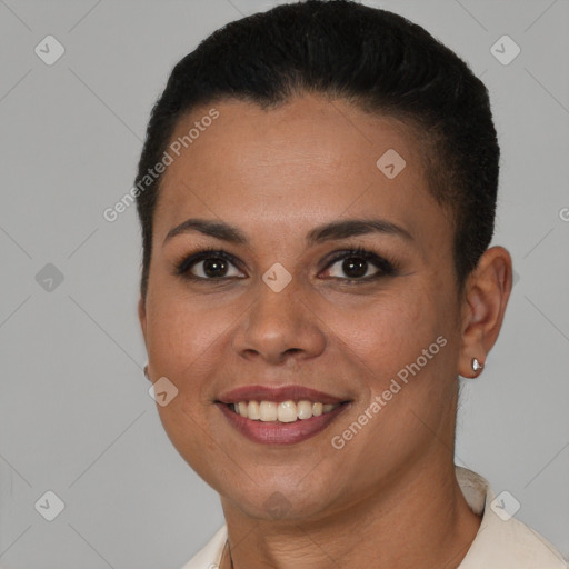 Joyful latino young-adult female with short  brown hair and brown eyes