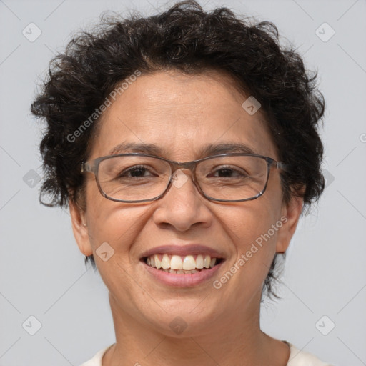 Joyful white adult female with short  brown hair and brown eyes