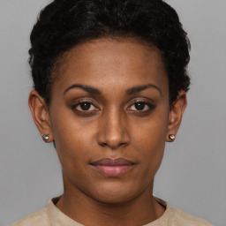 Neutral black young-adult female with short  black hair and brown eyes