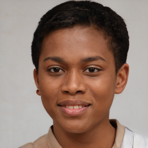 Joyful black young-adult female with short  brown hair and brown eyes
