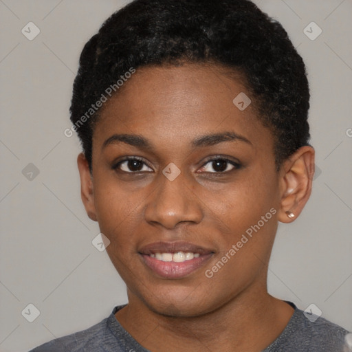 Joyful black young-adult female with short  black hair and brown eyes