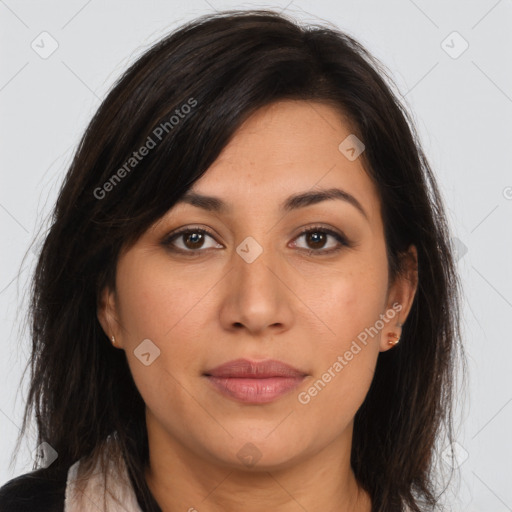 Joyful latino young-adult female with long  brown hair and brown eyes