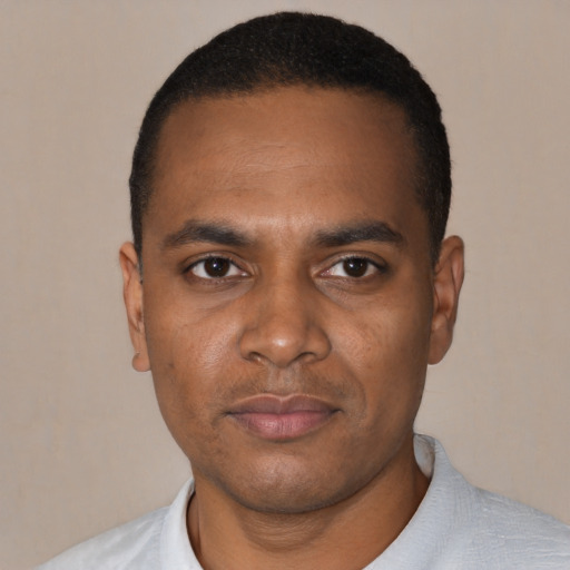 Neutral black young-adult male with short  black hair and brown eyes