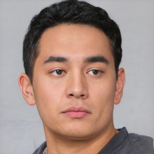 Neutral asian young-adult male with short  black hair and brown eyes
