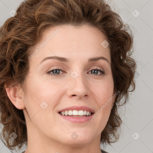 Joyful white young-adult female with medium  brown hair and green eyes