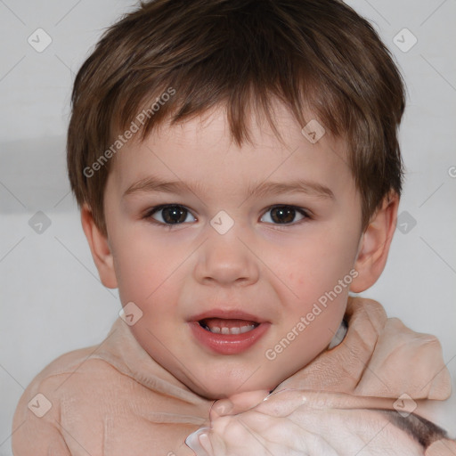 Joyful white child male with short  brown hair and brown eyes