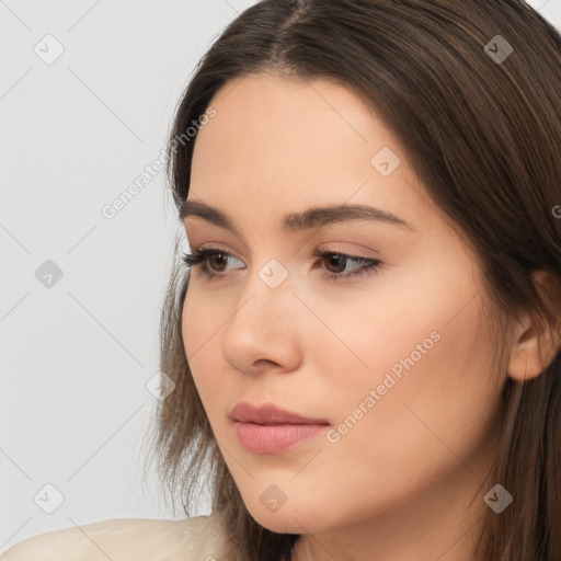 Neutral white young-adult female with long  brown hair and brown eyes