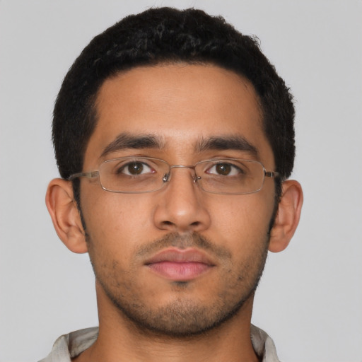 Neutral latino young-adult male with short  brown hair and brown eyes
