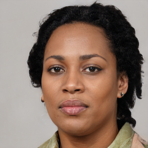 Neutral black young-adult female with short  black hair and brown eyes