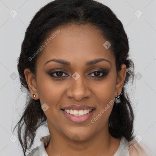 Joyful black young-adult female with long  brown hair and brown eyes