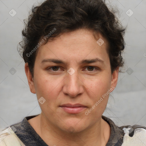 Joyful white adult female with short  brown hair and brown eyes