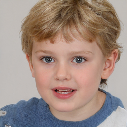 Joyful white child male with short  brown hair and grey eyes