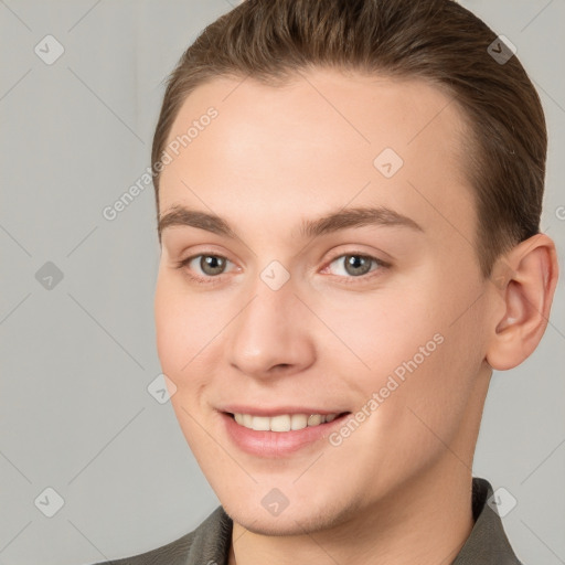 Joyful white young-adult female with short  brown hair and brown eyes