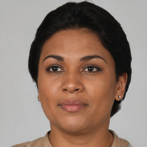 Neutral black young-adult female with short  black hair and brown eyes