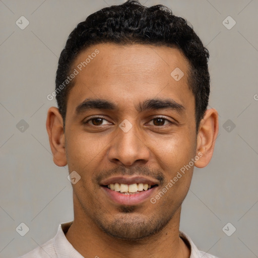 Joyful latino young-adult male with short  brown hair and brown eyes